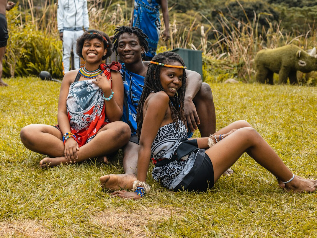 Group of friends sitting together and smiling