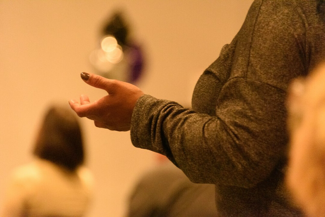 leader using hand gestures in presentation