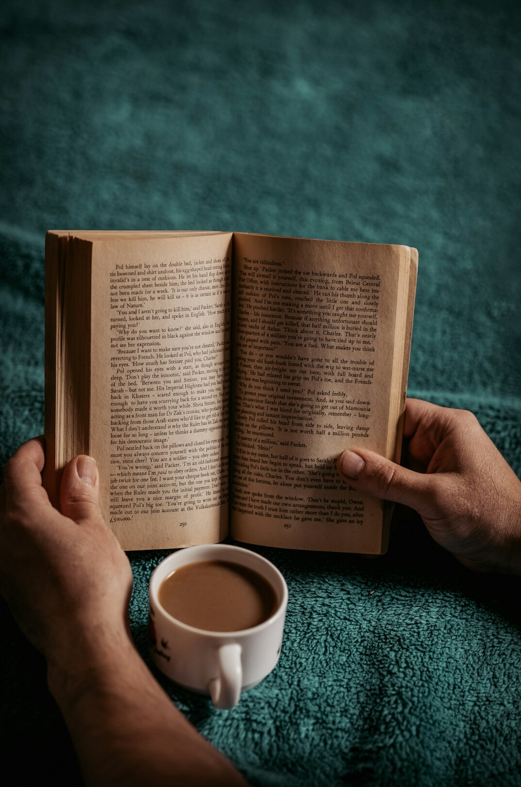 person reading self help book